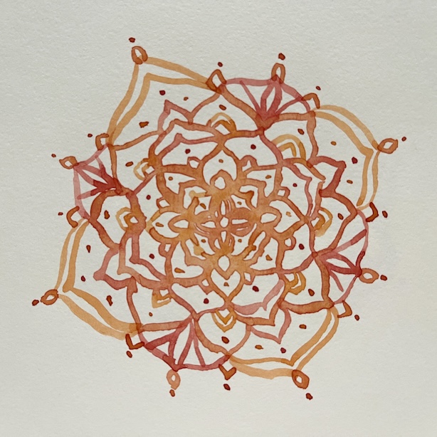 Raa'alla siennalla ja kylmällä punaisella maalattu akvarellimandala