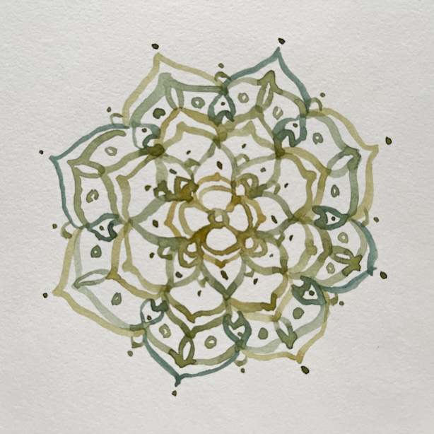 Raa'alla siennalla ja kylmällä sinisellä maalattu akvarellimandala