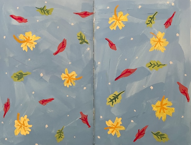 Luonnoskirja-aukaeama, jolle on maalattu siniselle taustalle punaisia, keltaisia ja vihreitä lehtiä